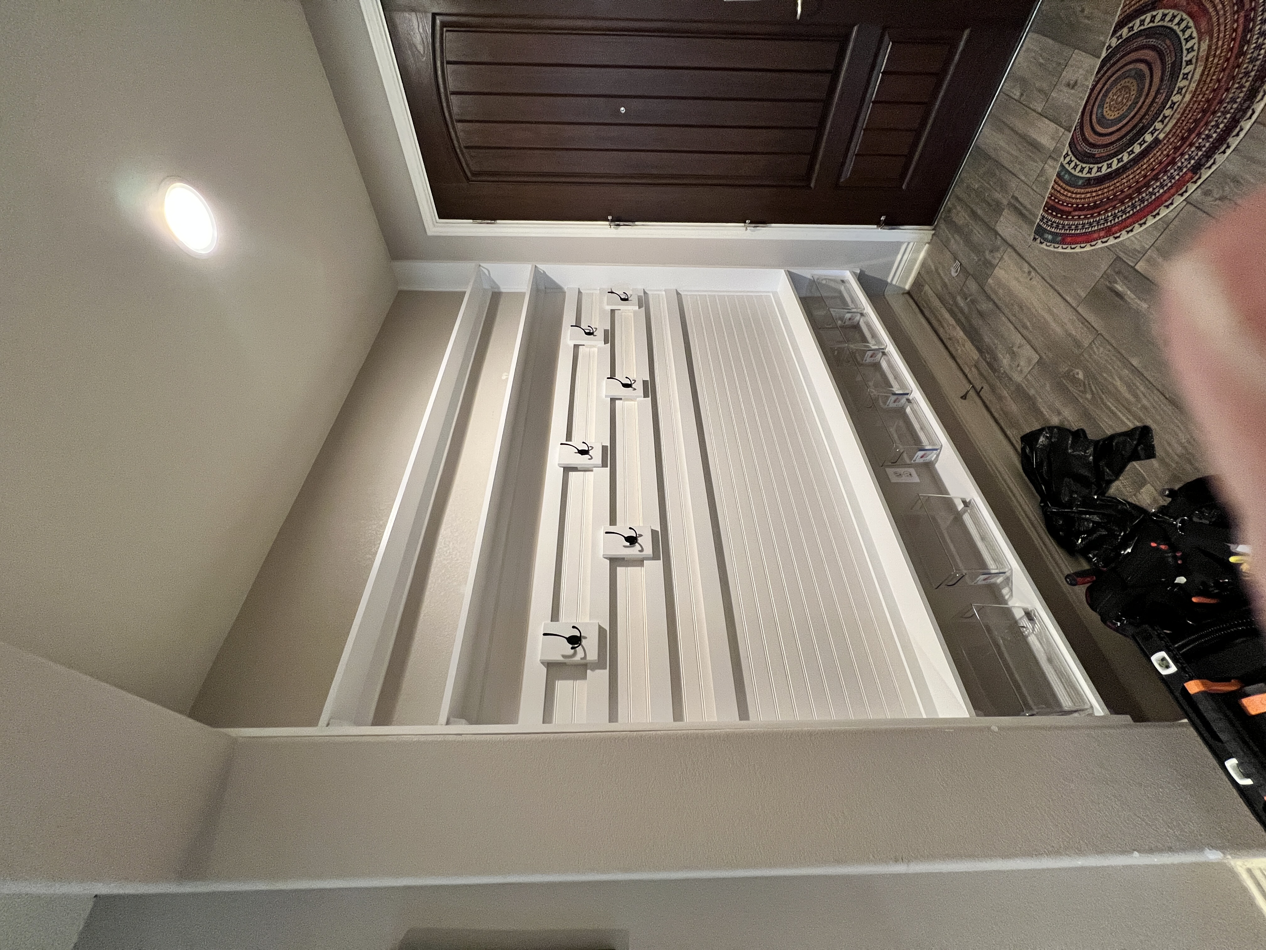 Hallway mudroom after conversion